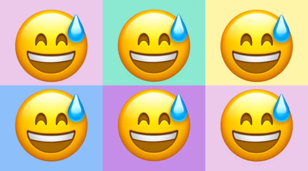 Emoji Wajah Tersenyum dengan Keringat
